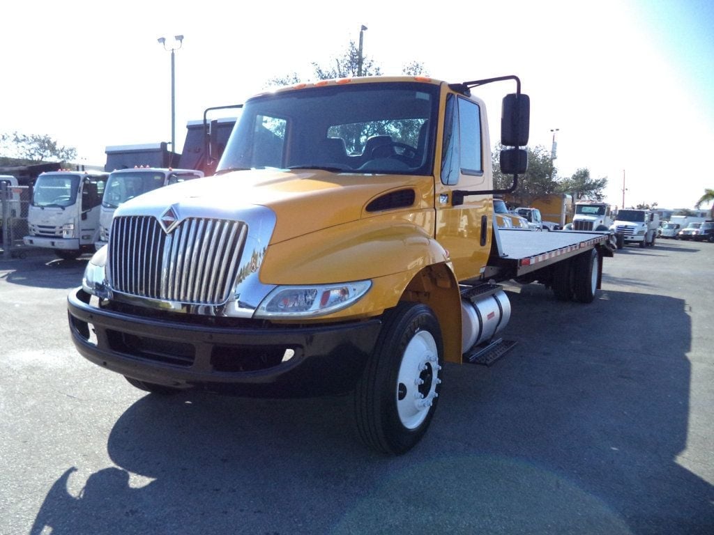 2019 International 4300 w/ 25ft Beaver Tail, Dove Tail, Ramp Truck Equip Hauler